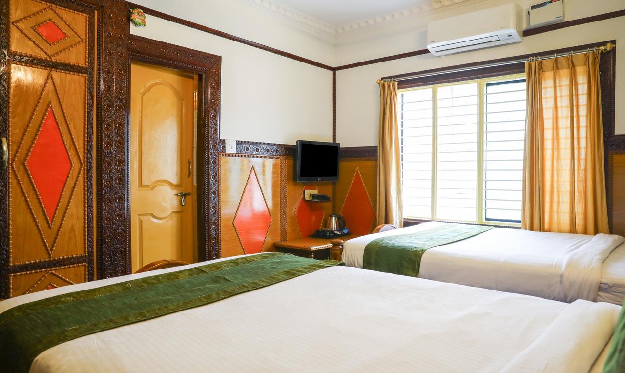 Treebo Nava Nidhi Comforts Bangalore Exterior foto
